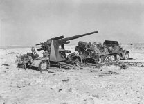 Burnt-out_88_mm_Flak_36_near_El_Alamein_1942.jpg