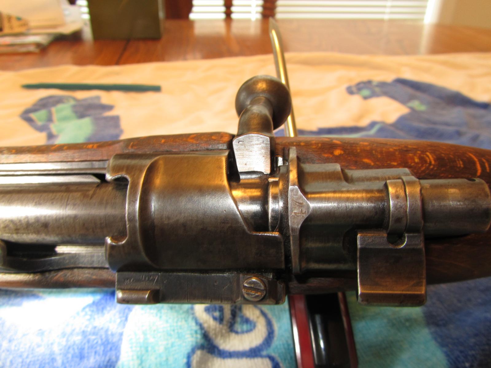 wiped sn`s on safety latch, end cap, and handle + added to end cap. you can see the remnence of a 7 on the handle. 47 is visible on the bolt release